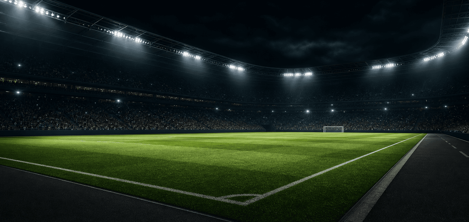 Floodlit football stadium pitch